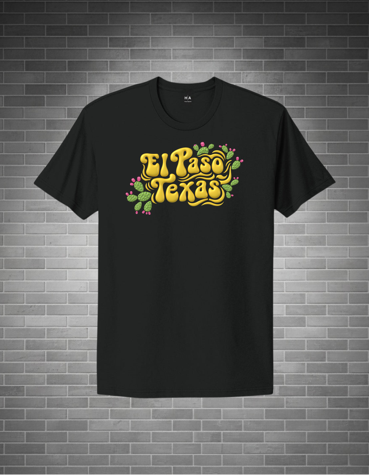 Black t-shirt with 'El Paso Texas' text and cactus graphics on a brick wall background