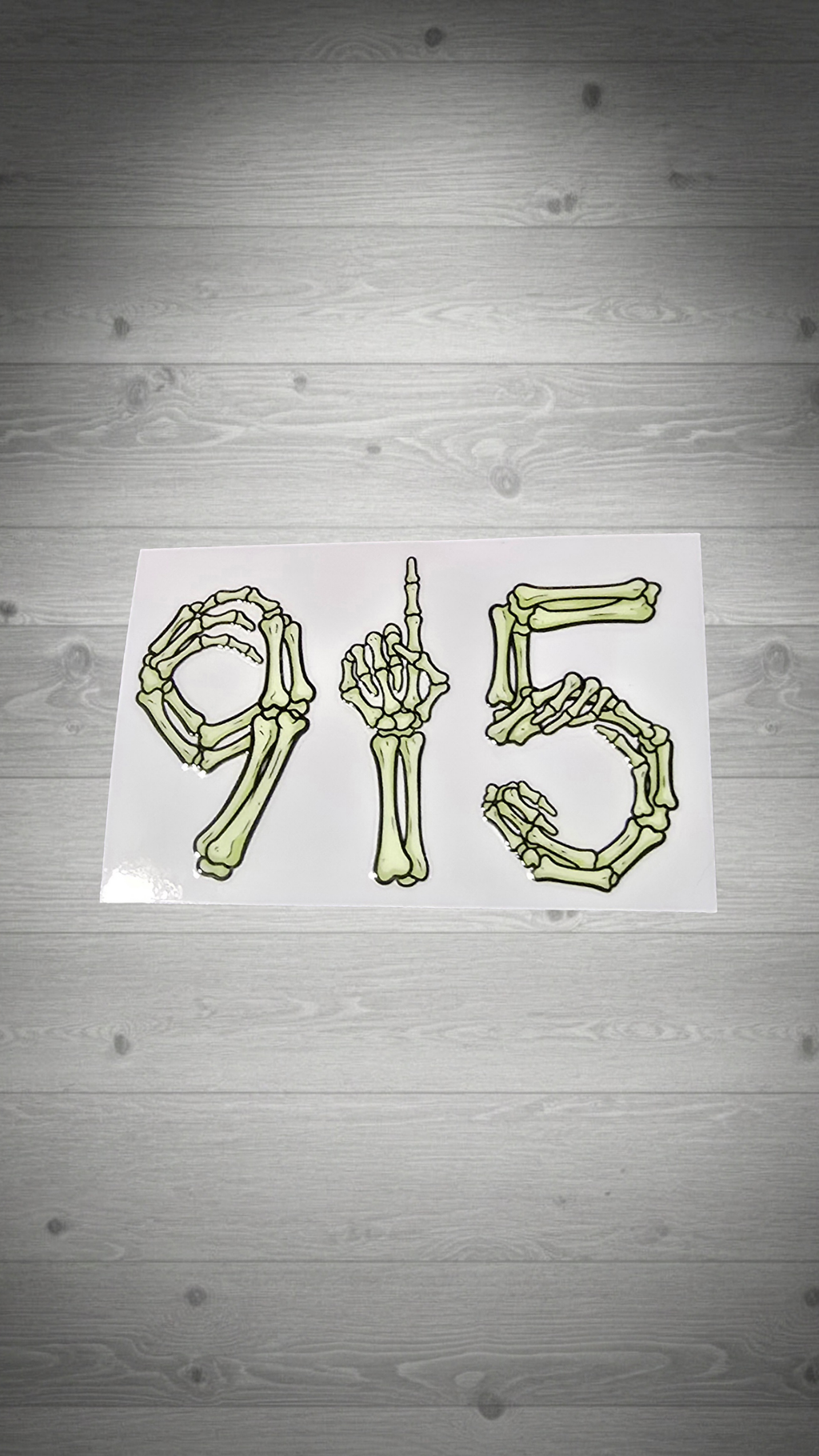 915 skeleton bones front view grey wooden wall