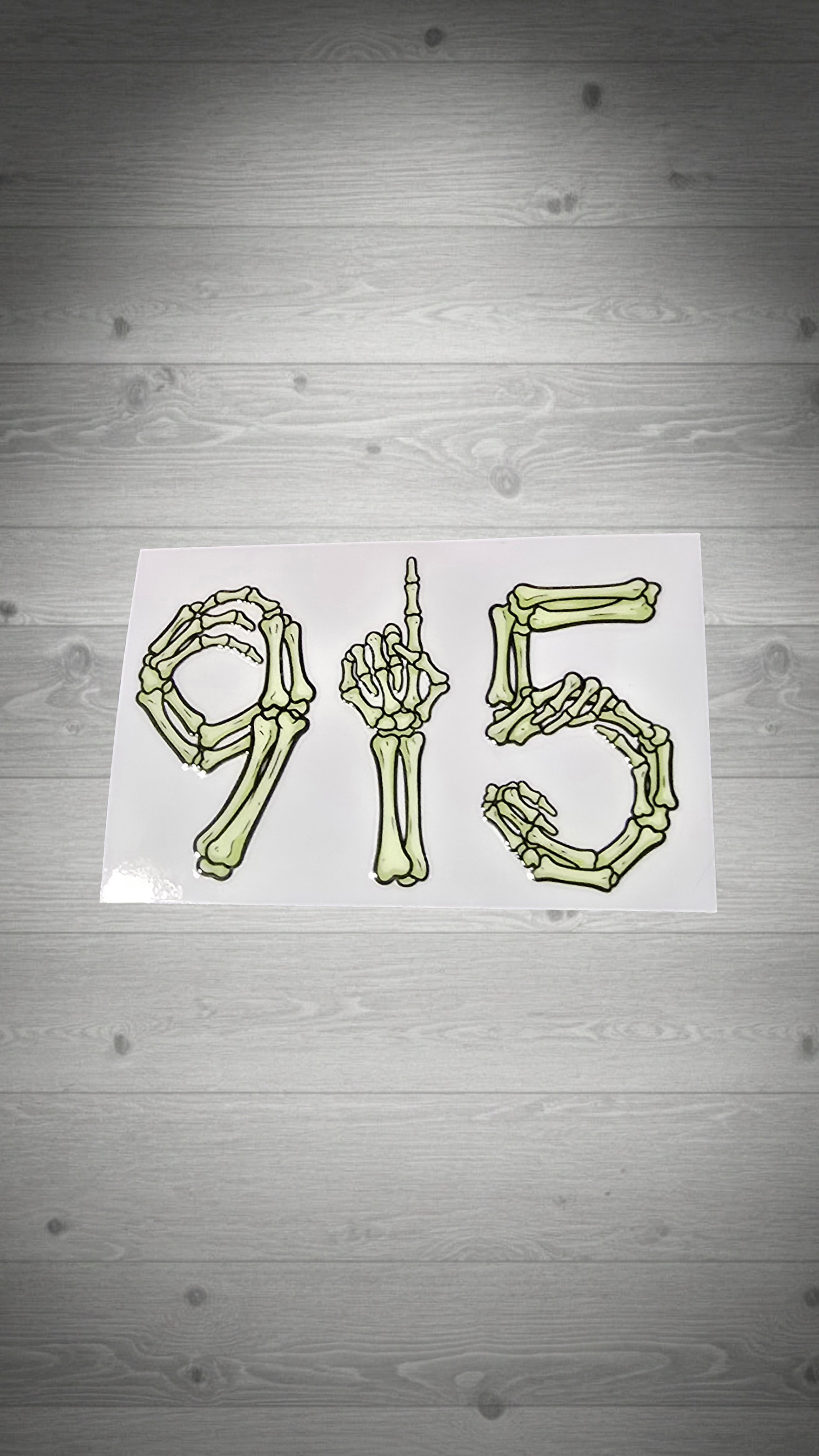 915 skeleton bones front view grey wooden wall