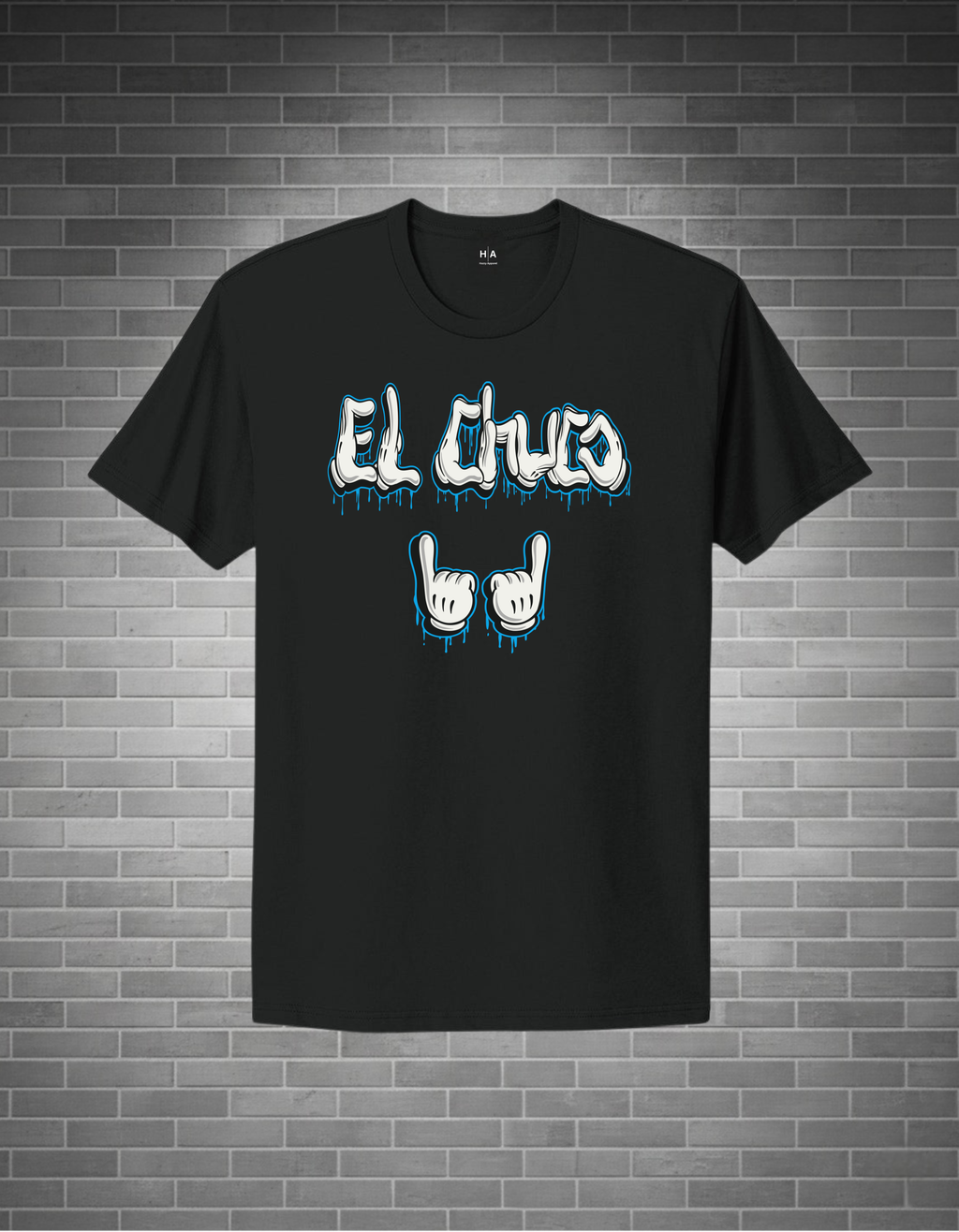Black t-shirt with 'El Cluco' text and hand signs on a brick wall background