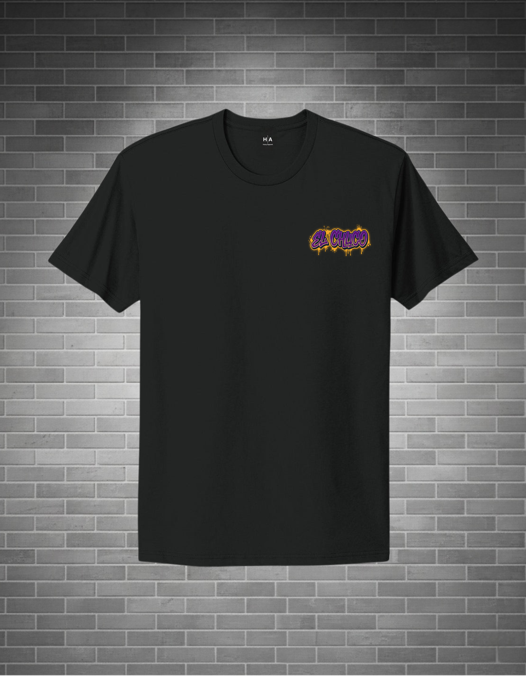 Black t-shirt with a logo on the chest against a brick wall background