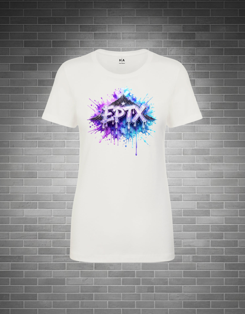 White t-shirt with colorful 'EPTX' design on a gray brick wall background
