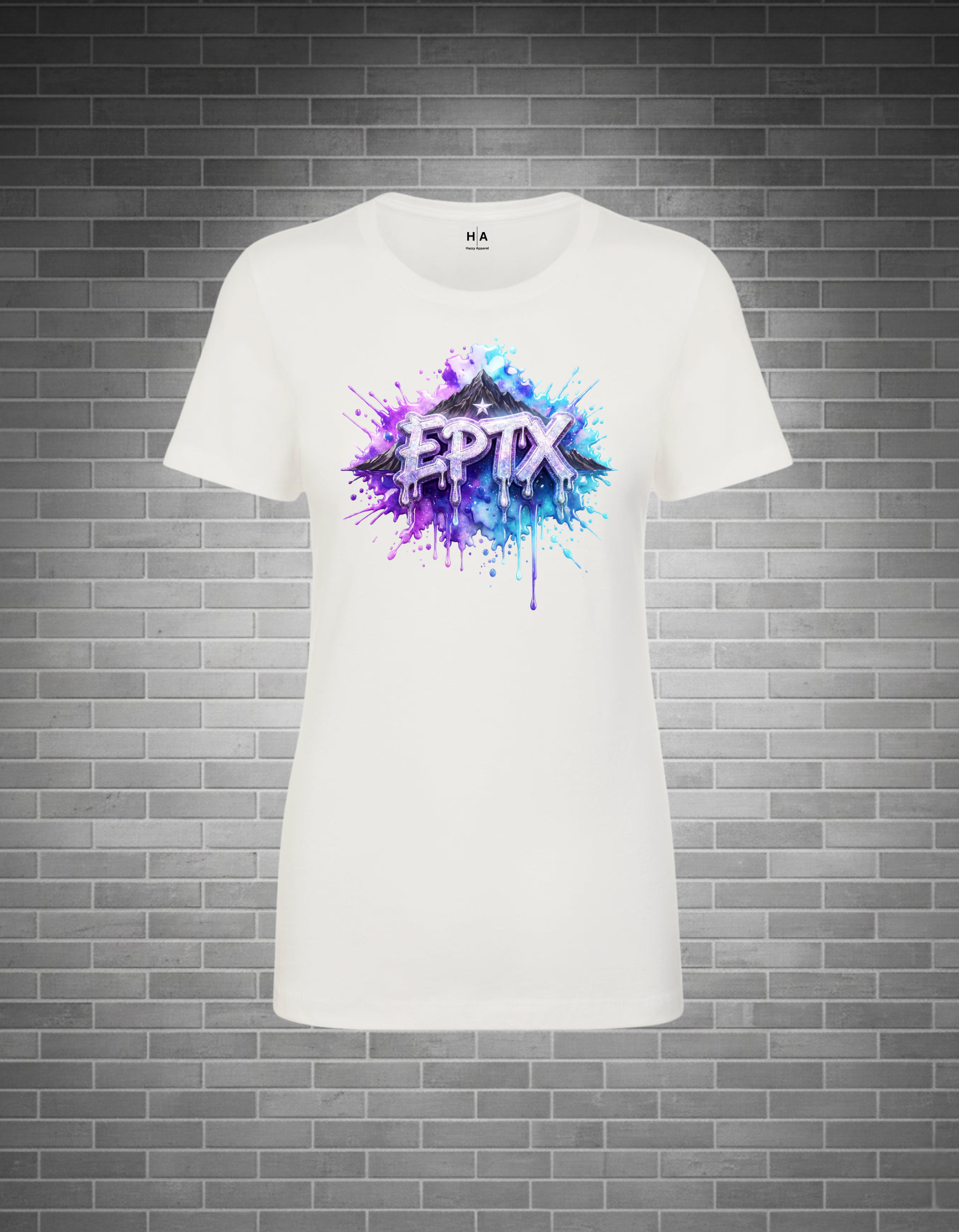 White t-shirt with colorful 'EPTX' design on a gray brick wall background